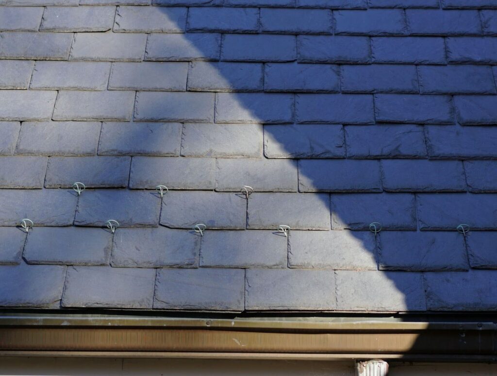 Detailed shot showing the texture and pattern of slate roofing.