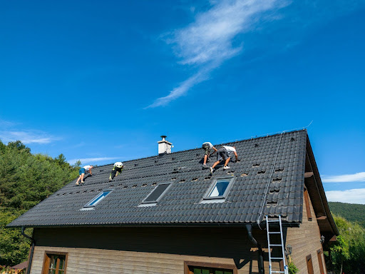 Roofing crew performing a new roof installation.